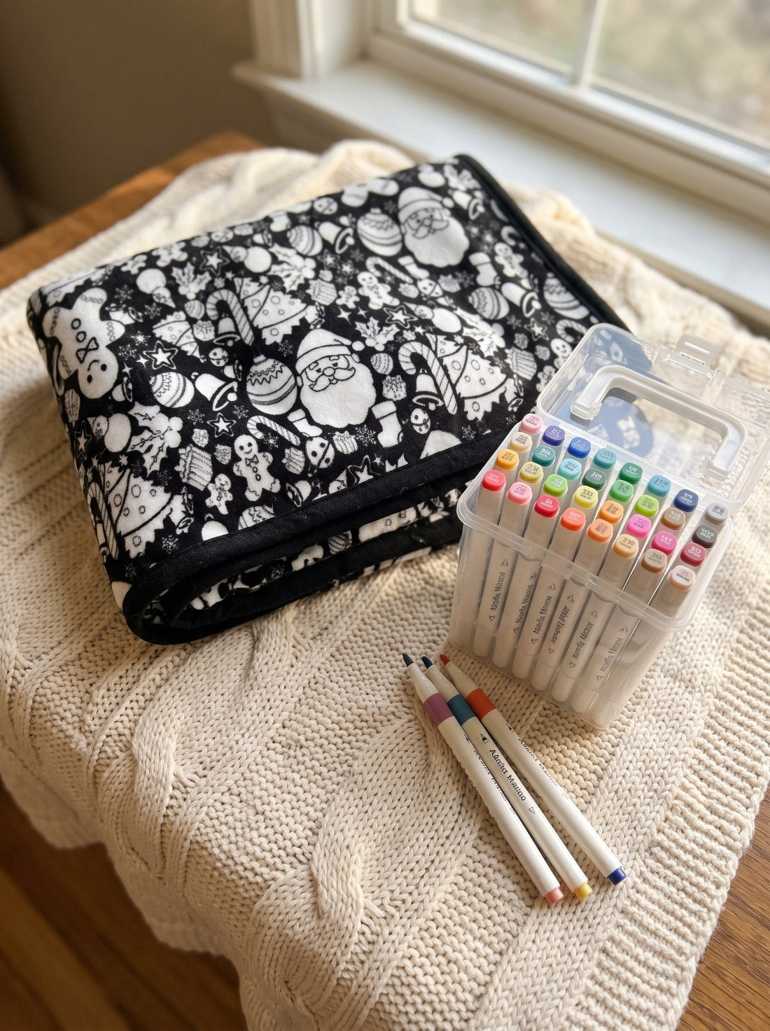 Folded coloring blanket with the 24 fabric marker set